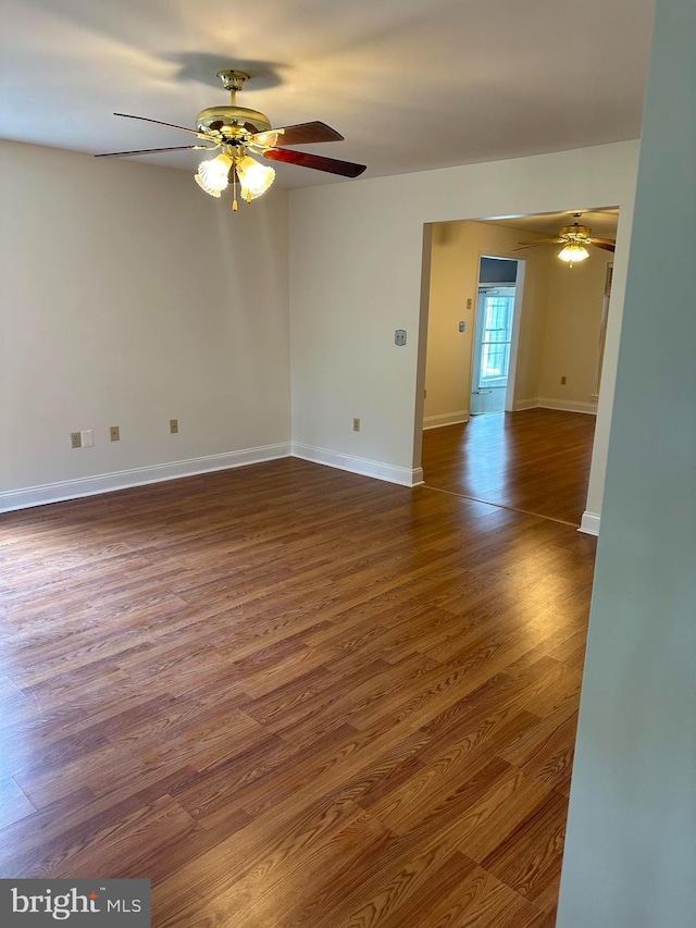 spare room featuring dark hardwood / wood-style floors