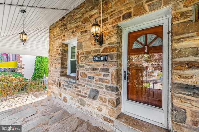 entrance to property with a porch