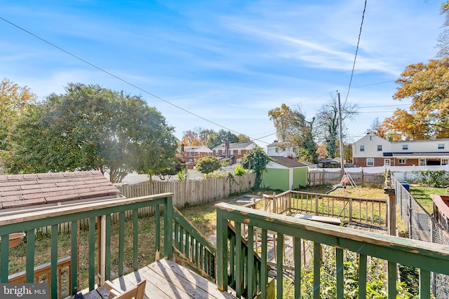 deck featuring an outdoor structure