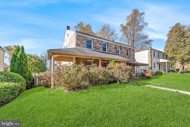 view of front of house featuring a front yard