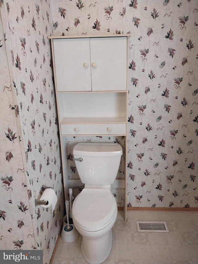 bathroom featuring toilet