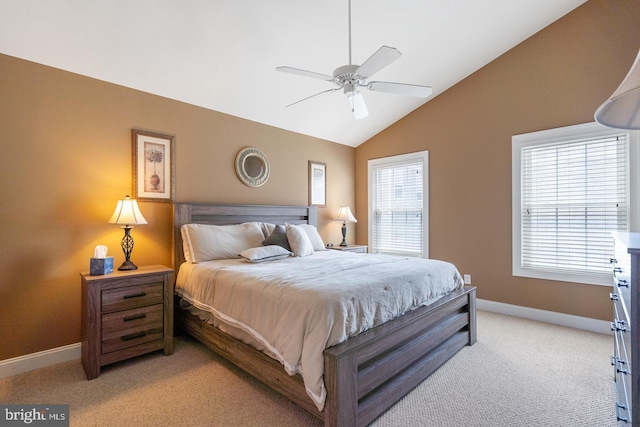 bedroom with lofted ceiling, light carpet, and ceiling fan