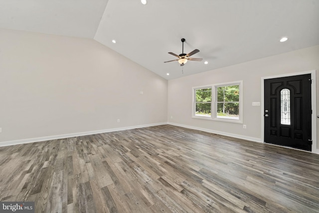 interior space featuring lofted ceiling, hardwood / wood-style floors, and ceiling fan