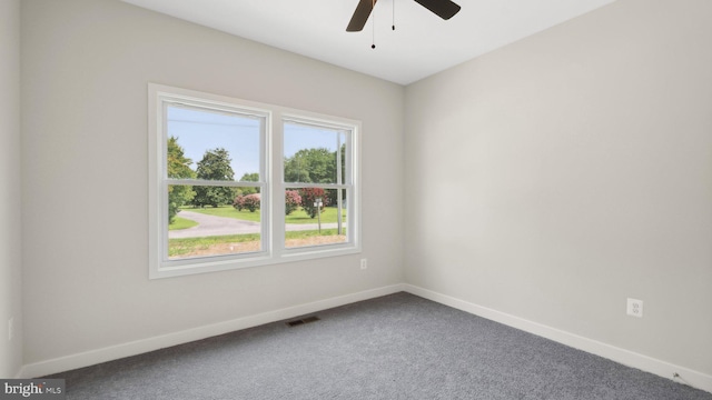 carpeted empty room with ceiling fan