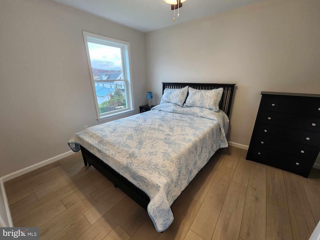 bedroom with light hardwood / wood-style floors