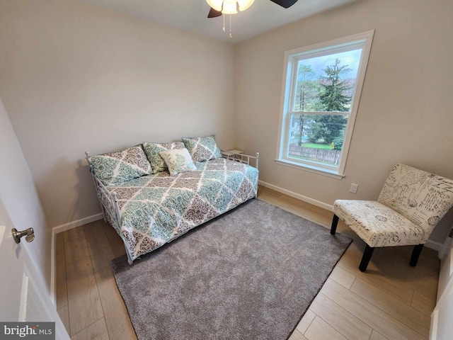 bedroom featuring ceiling fan and light hardwood / wood-style floors