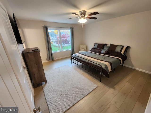 bedroom featuring ceiling fan and light wood-type flooring