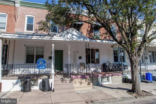 multi unit property featuring covered porch