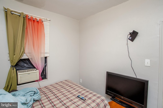 bedroom featuring cooling unit