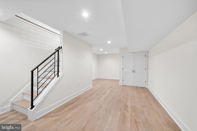 basement with light wood-type flooring