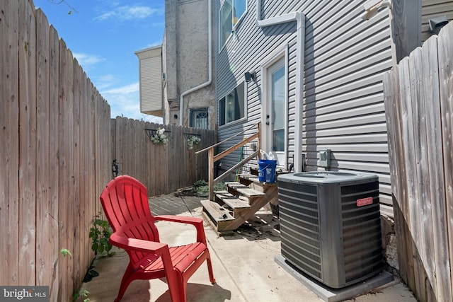 view of patio featuring central air condition unit