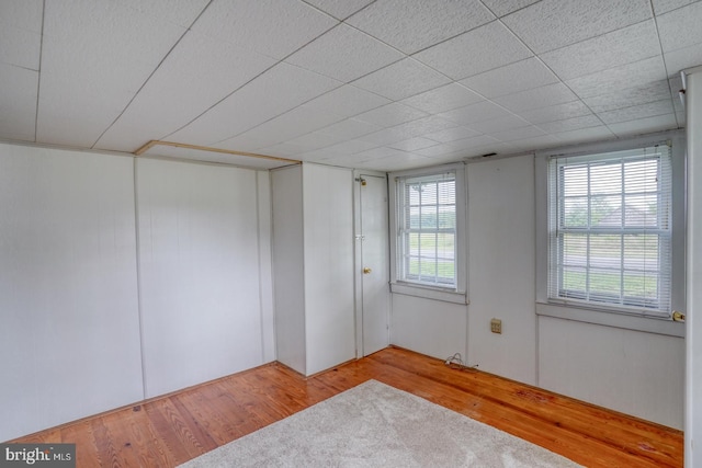 spare room featuring hardwood / wood-style floors