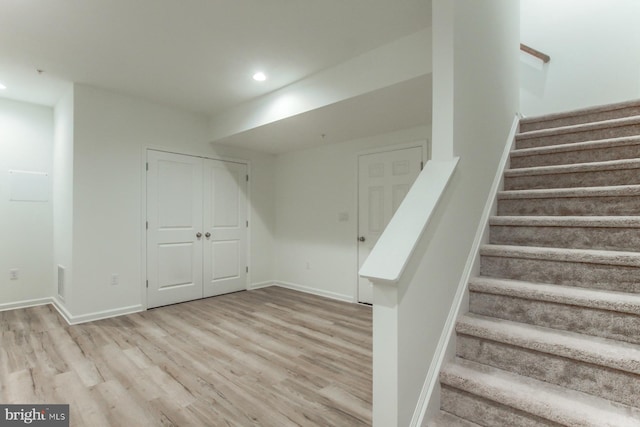 interior space with hardwood / wood-style floors