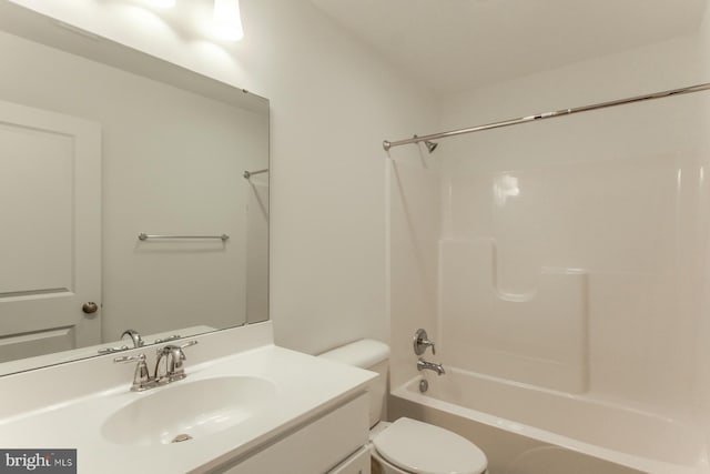 full bathroom featuring shower / bathing tub combination, toilet, and vanity