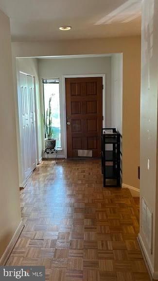 entrance foyer with parquet floors