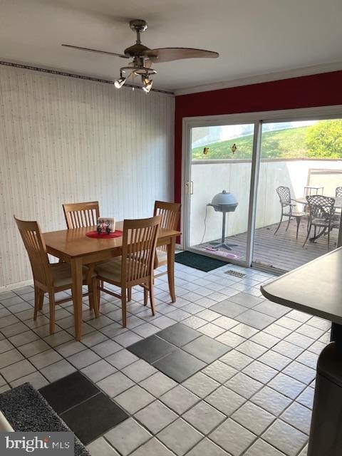 dining area featuring light tile patterned floors, a wealth of natural light, and ceiling fan