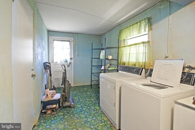 laundry area with separate washer and dryer