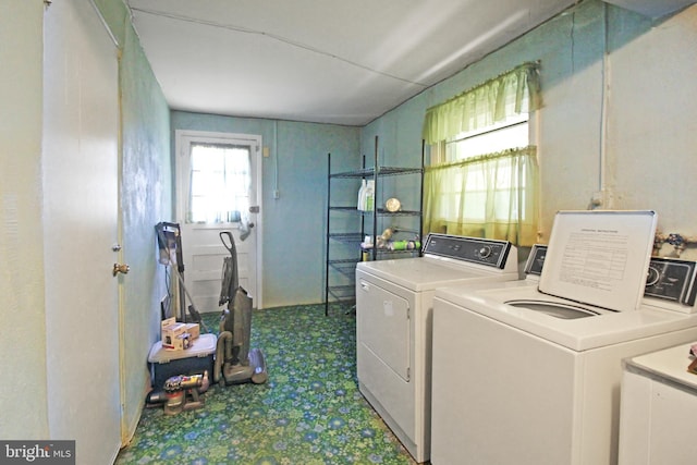 laundry room featuring separate washer and dryer