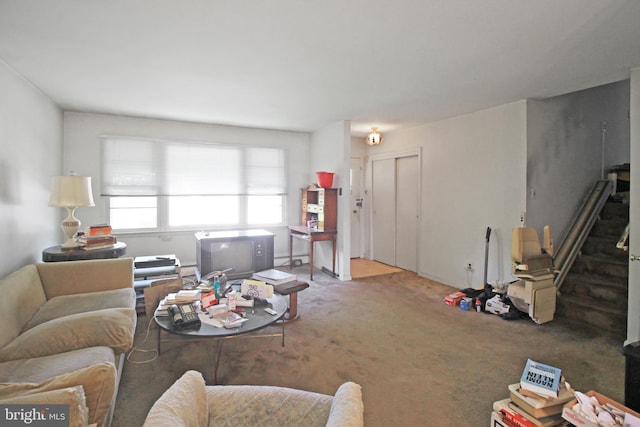 unfurnished living room featuring carpet floors