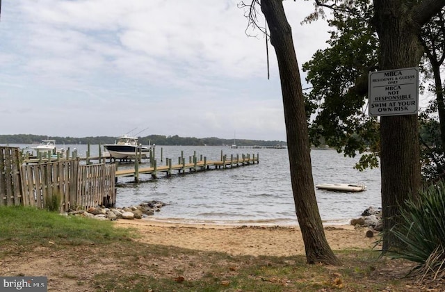 dock area featuring a water view