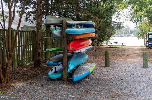 view of play area with a water view