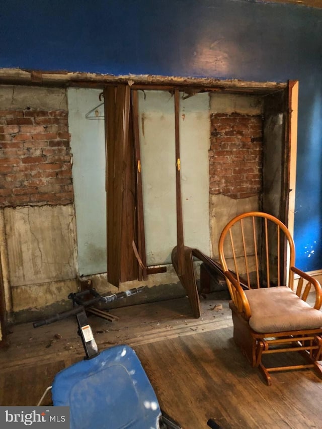 miscellaneous room with wood-type flooring