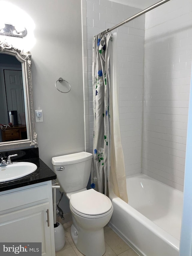 full bathroom with tile patterned flooring, vanity, shower / tub combo with curtain, and toilet