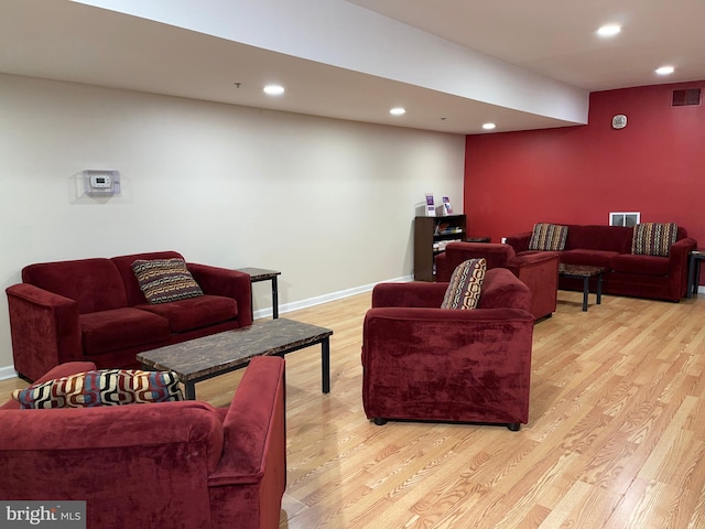 living room with light hardwood / wood-style floors