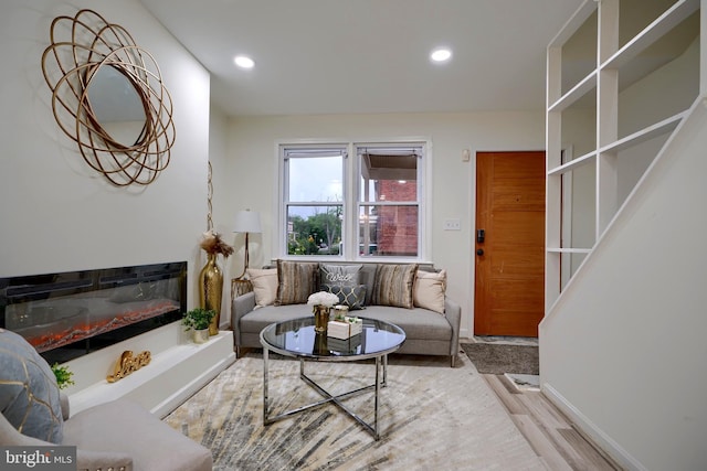 living room with light hardwood / wood-style floors