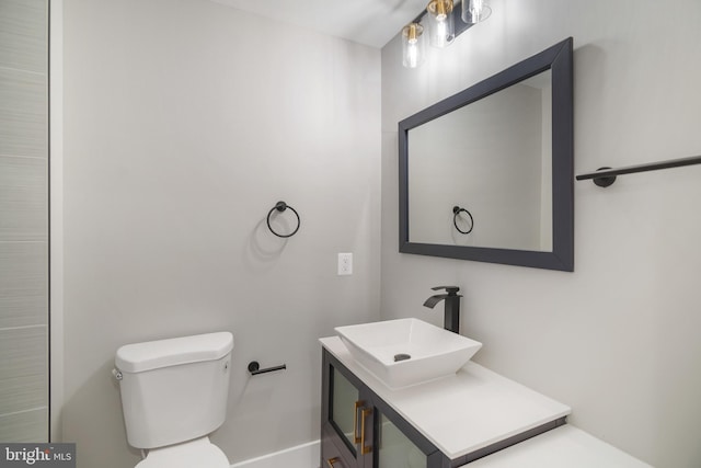 bathroom with toilet and sink