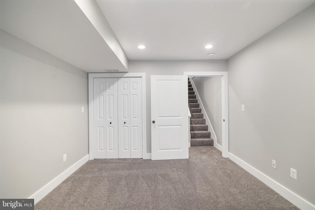 basement featuring carpet floors