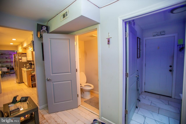 bathroom featuring toilet