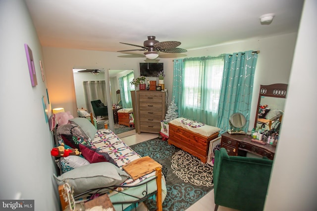 interior space featuring ceiling fan