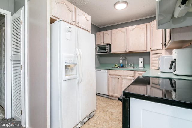 kitchen featuring a textured ceiling, white appliances, a sink, exhaust hood, and light brown cabinetry