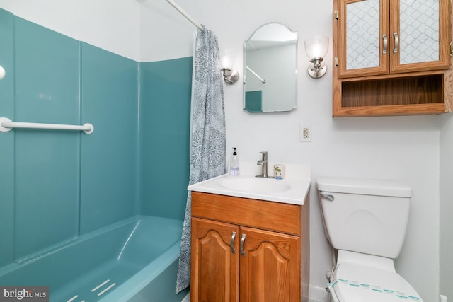 bathroom featuring vanity, toilet, and shower / bathtub combination with curtain