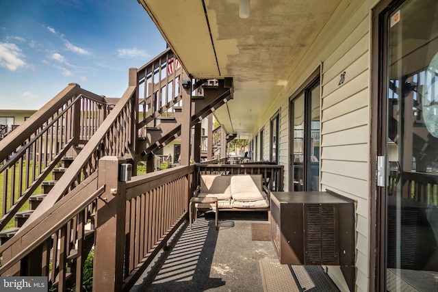 balcony featuring stairway