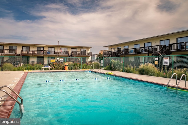 pool featuring fence