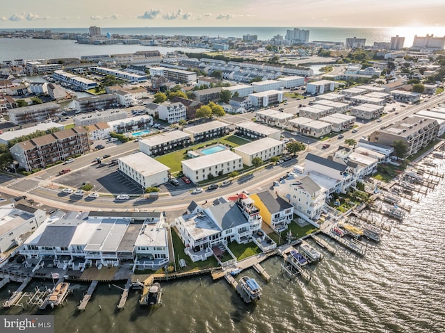 drone / aerial view with a water view and a view of city