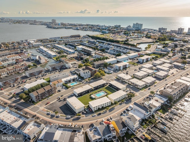 bird's eye view featuring a water view and a city view