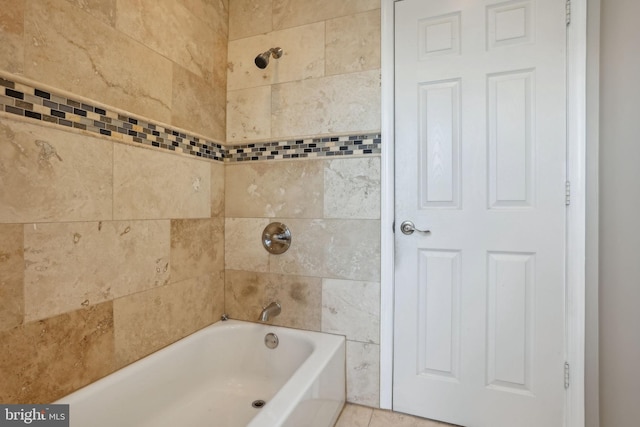 bathroom featuring shower / bathing tub combination and tile patterned flooring