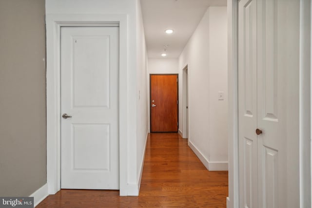 hall featuring hardwood / wood-style flooring