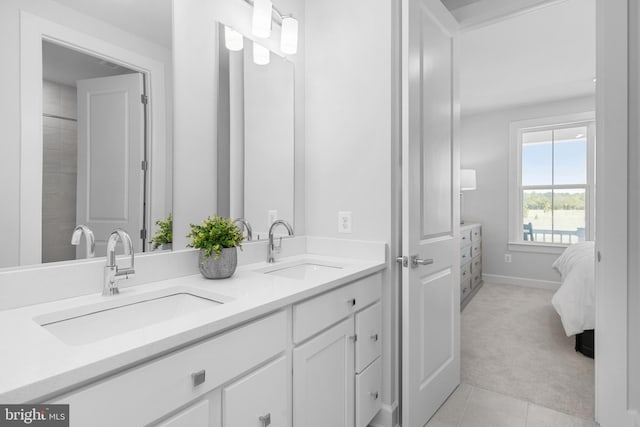 bathroom with vanity and tile patterned flooring