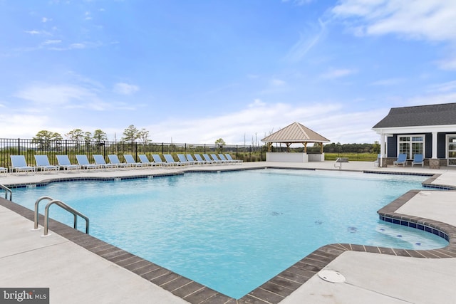 view of pool featuring a gazebo and a patio