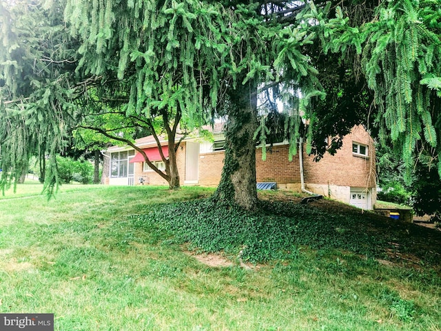 view of yard featuring a garage