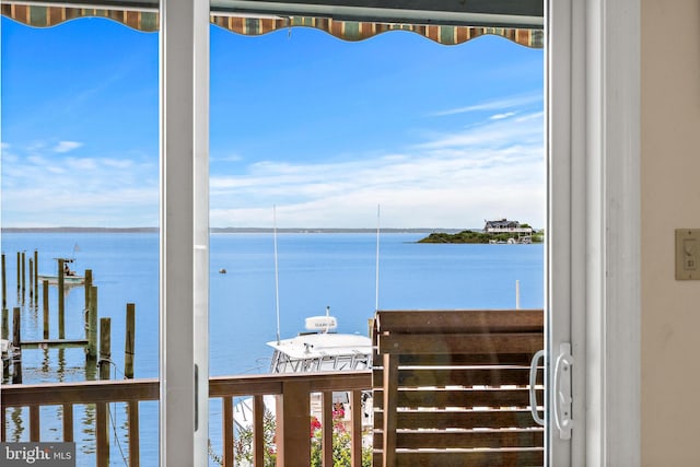 view of water feature with a dock