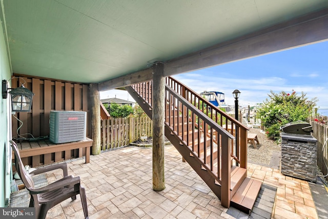 view of patio / terrace with central AC unit