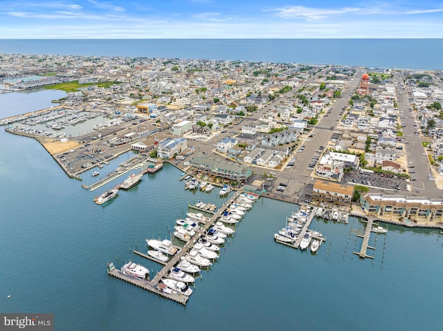 birds eye view of property featuring a water view