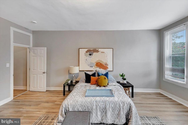 bedroom featuring light hardwood / wood-style floors