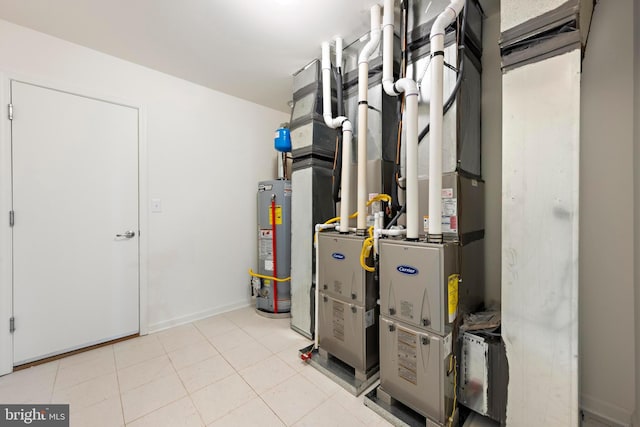 utility room featuring water heater