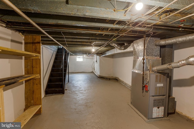 basement featuring heating unit